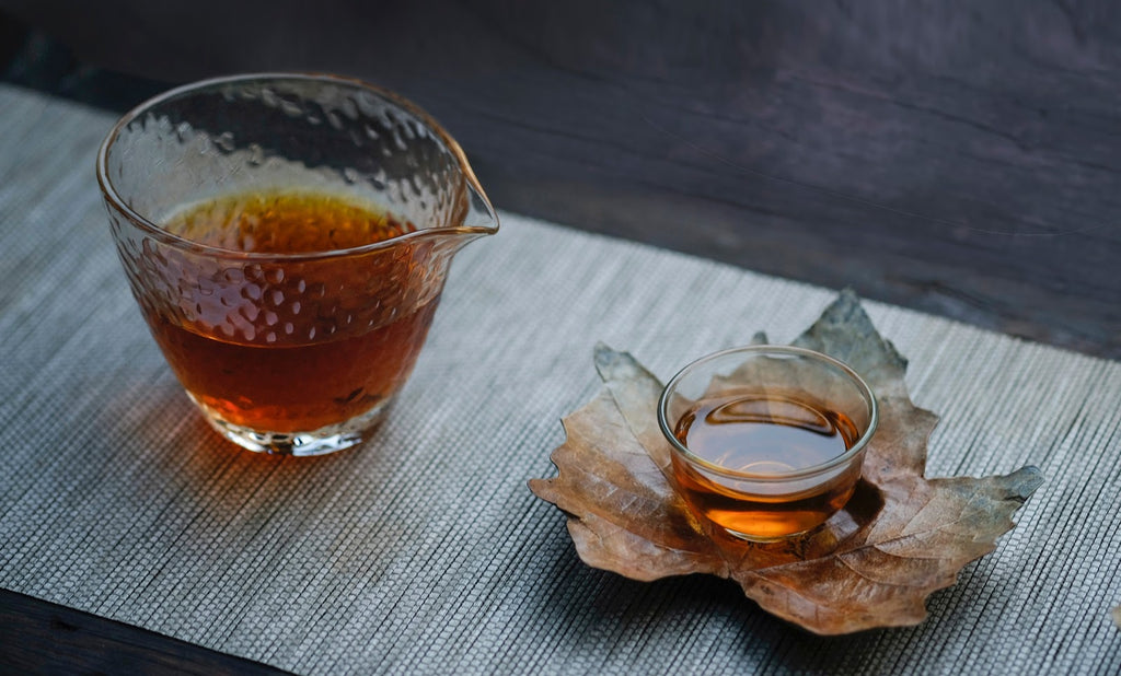 fall orange herbal tea in small glasses 